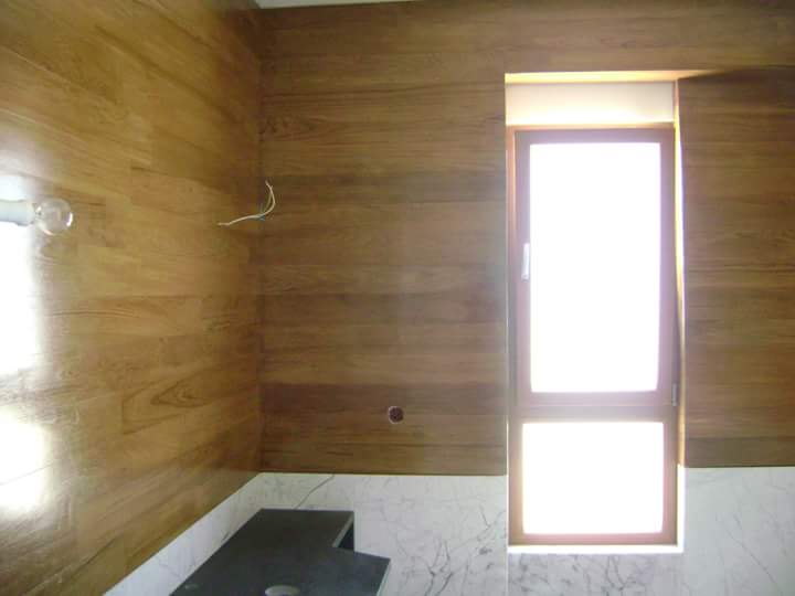Ξύλινη επένδυση τοίχου από Δρυς σε μονοκατοικία στην Κηφισιά - Έργα Αντωνόπουλος